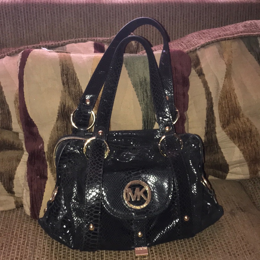 Black and gold Michael Kors Hand Bag